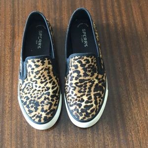 Sperri cheetah print calf hair slip on shoes.